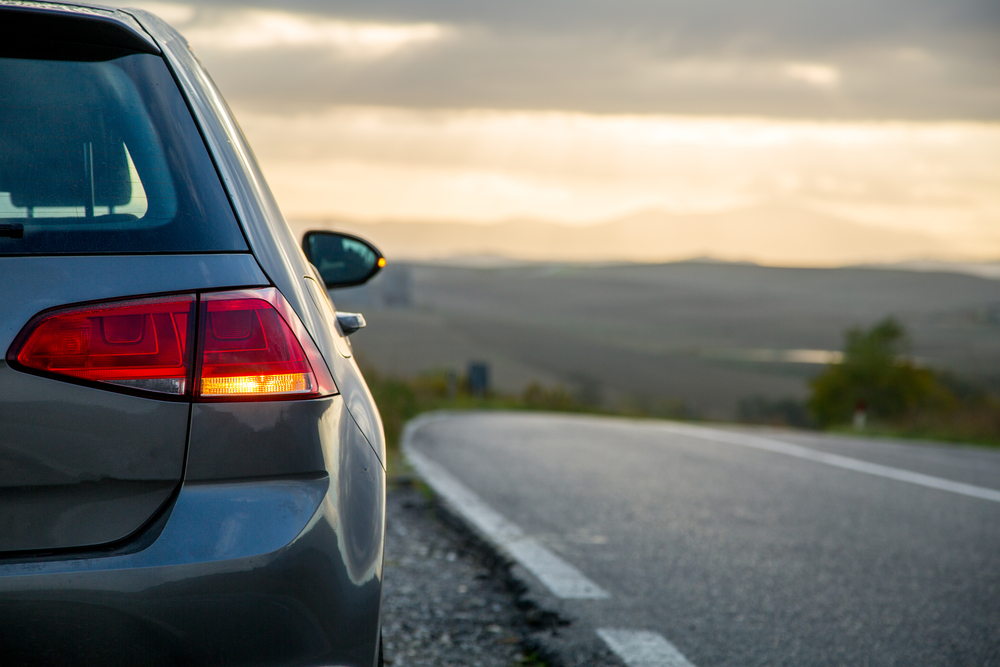 Car,Rental,Parking,On,The,Asphalt,Road,,tuscany,Italy.
